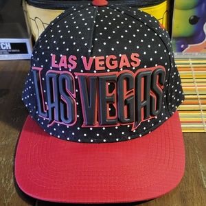 I am selling a Las Vegas hat, Batman lunch box, 2 rainbow funko, Deadpool figure